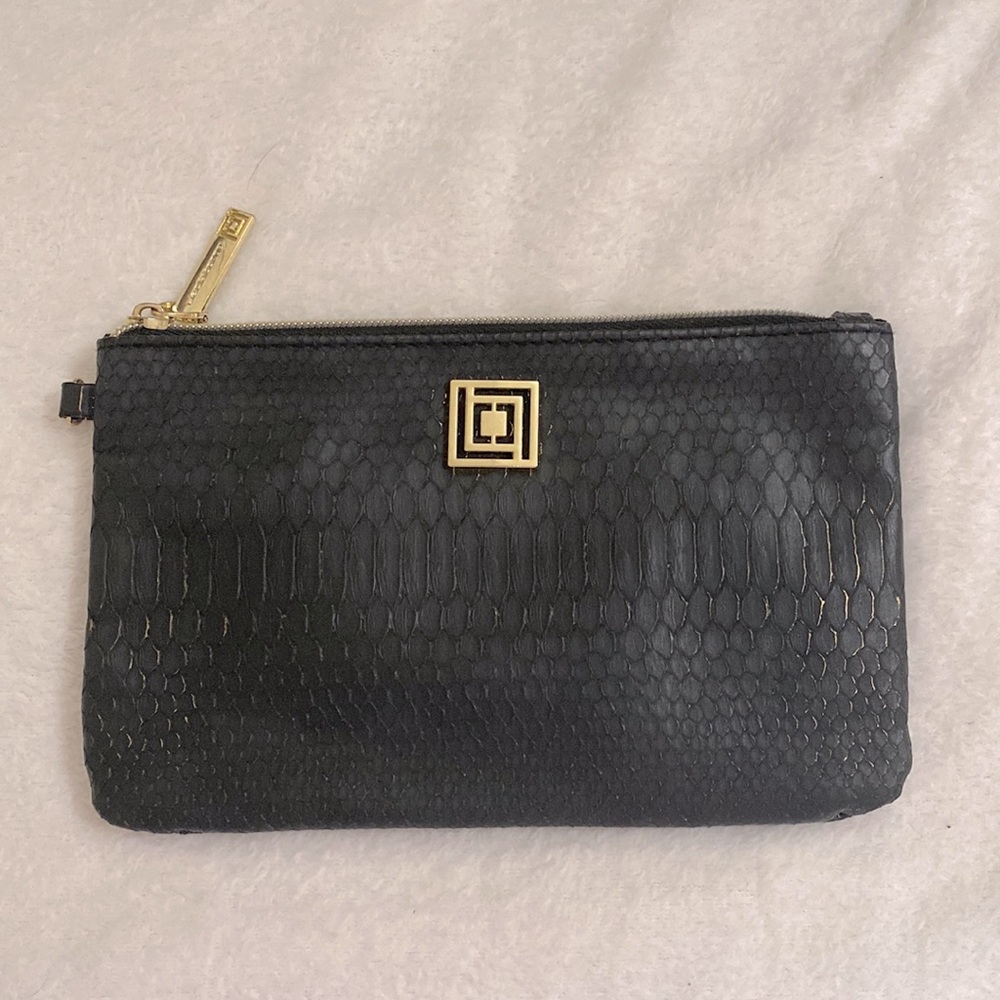 Liz Claiborne clutch with power bank